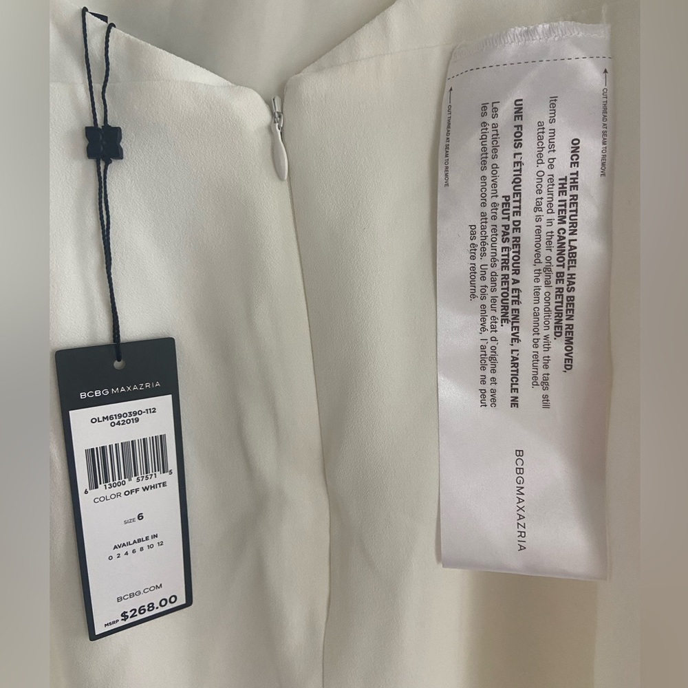 Bcbg cocktail dress. White with sequin details along the top. Cocktail